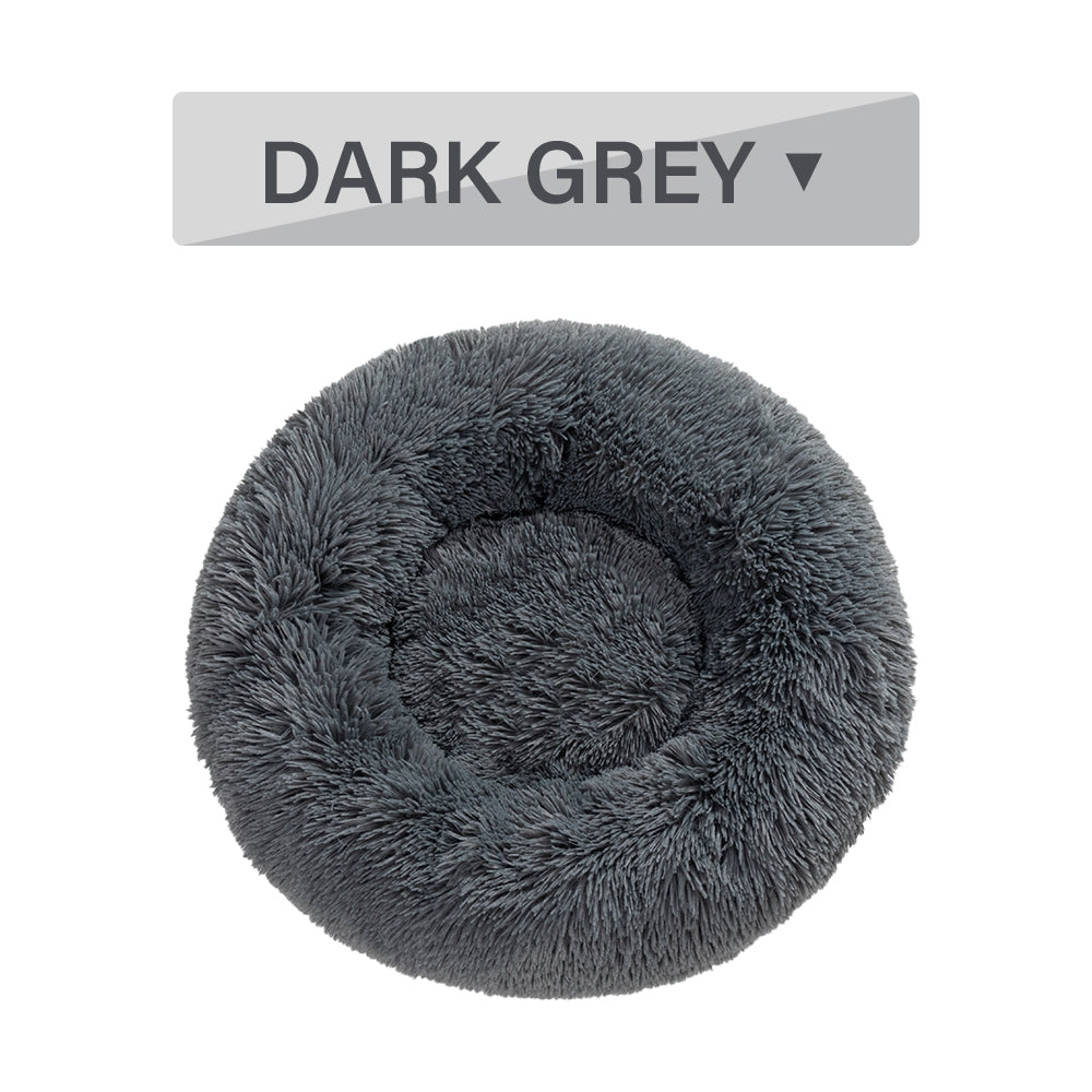 Luxurious Fluffy Donut Dog Bed, ideal for all breeds. Premium plush for comfort, warmth, and relaxation.