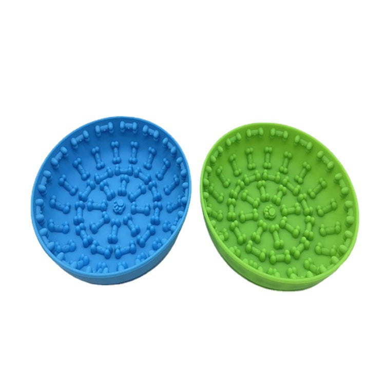 A pet bowl designed with suction cups and non-slip silicone material to prevent sliding, ideal for pets during mealtime